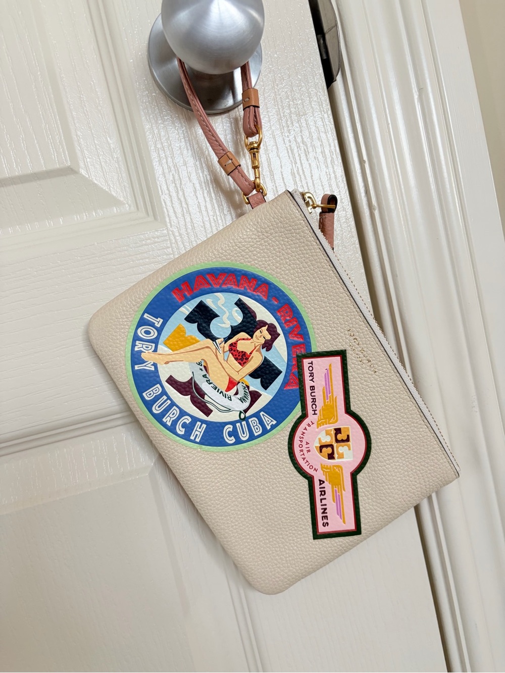Tory Burch Cream Leather Wristlet with Travel Motif